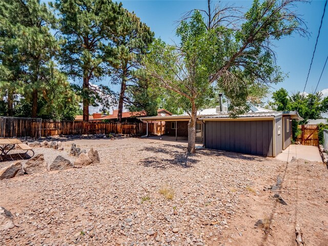 85 Chiquita Dr, White Rock, NM 87547 - fenced backyard featuring a patio