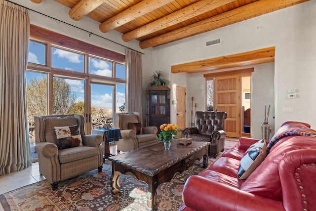 44 Lodge Cir Unit C, Santa Fe, NM 87506 - tiled living area featuring a wood ceiling with exposed beams and plenty of natural light