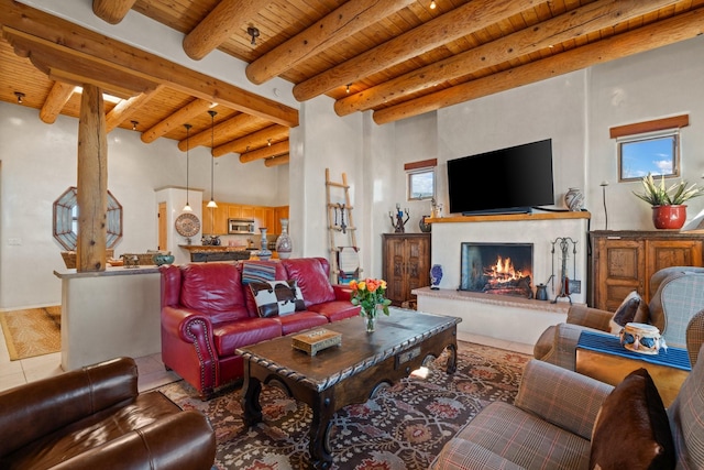 44 Lodge Cir Unit C, Santa Fe, NM 87506 - living room featuring a wooden ceiling with exposed beams, tile patterned floors, and a lit fireplace