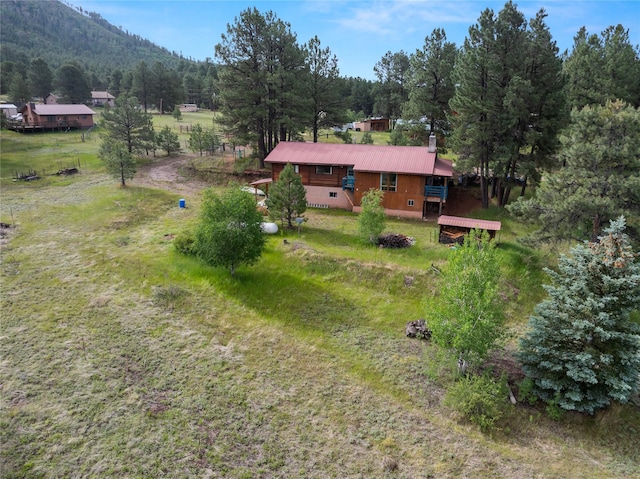 19 Canoe Ct, Jemez Springs, NM 87025 - view from above of property featuring a forest and a mountain backdrop
