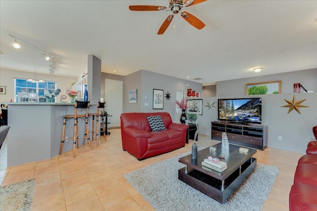 3 Hunters Run, Santa Fe, NM 87508 - tiled living room with ceiling fan, healthy amount of natural light, and rail lighting