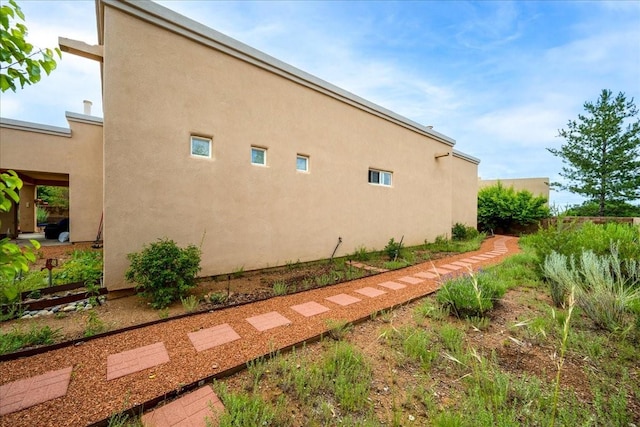 3 Hunters Run, Santa Fe, NM 87508 - view of property exterior with stucco siding