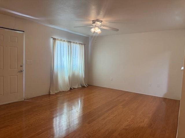 2210 Miguel Chavez Unit 1816, Santa Fe, NM 87505 - unfurnished room featuring a ceiling fan and wood finished floors
