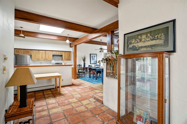 4 Village Pl, White Rock, NM 87547 - kitchen with refrigerator, beamed ceiling, a baseboard heating unit, range hood, and a ceiling fan