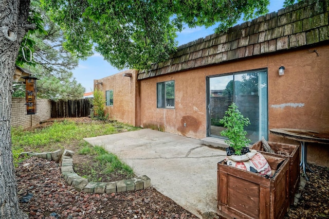 4 Village Pl, White Rock, NM 87547 - fenced backyard with a patio