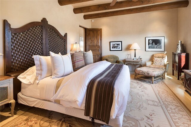 5 N Brisa Fresca, Santa Fe, NM 87506 - bedroom featuring beamed ceiling, wood finished floors, and ceiling fan