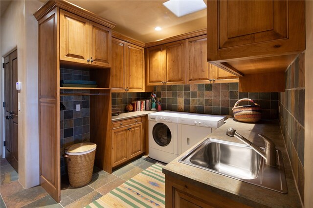 5 N Brisa Fresca, Santa Fe, NM 87506 - washroom with cabinet space, washing machine and clothes dryer, and a skylight