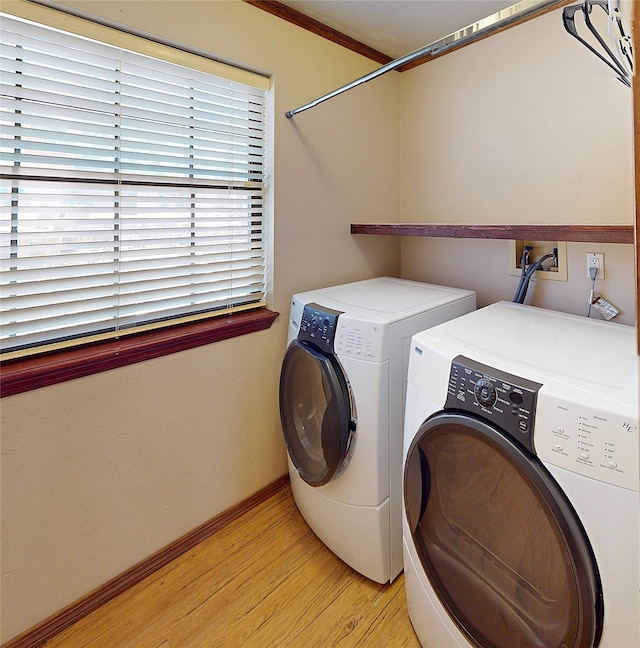 986 Alamo Rd, Los Alamos, NM 87544 - washroom with separate washer and dryer and light wood-type flooring