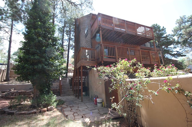 986 Alamo Rd, Los Alamos, NM 87544 - rear view of house featuring stairway and a balcony
