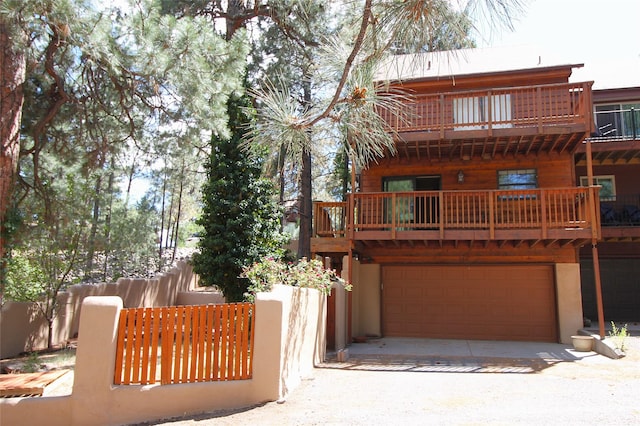 986 Alamo Rd, Los Alamos, NM 87544 - view of front of property featuring a balcony and an attached garage