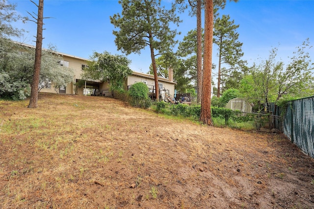 2122 41st Unit B, Los Alamos, NM 87544 - view of yard featuring a storage unit