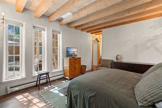 3B Camino Miguel, Santa Fe, NM 87506 - bedroom with a baseboard heating unit, beamed ceiling, and wood finished floors