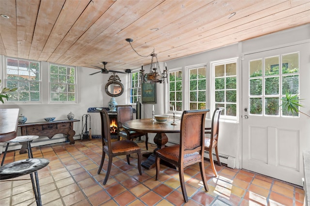 3B Camino Miguel, Santa Fe, NM 87506 - dining space featuring wooden ceiling, a baseboard heating unit, light tile patterned floors, and ceiling fan