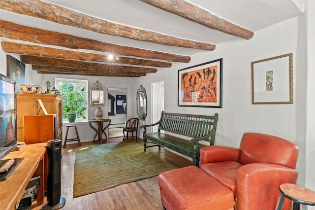 3B Camino Miguel, Santa Fe, NM 87506 - living room featuring beamed ceiling, wood finished floors, and baseboard heating
