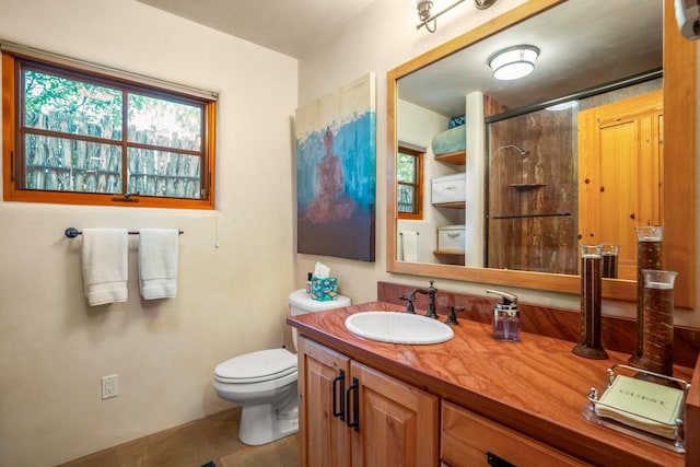 659 Bishops Ldg Unit 1 & 2, Santa Fe, NM 87501 - bathroom with a shower, tile patterned floors, and vanity