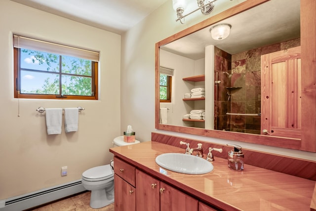 659 Bishops Ldg Unit 1 & 2, Santa Fe, NM 87501 - bathroom featuring a baseboard radiator, a tile shower, and vanity