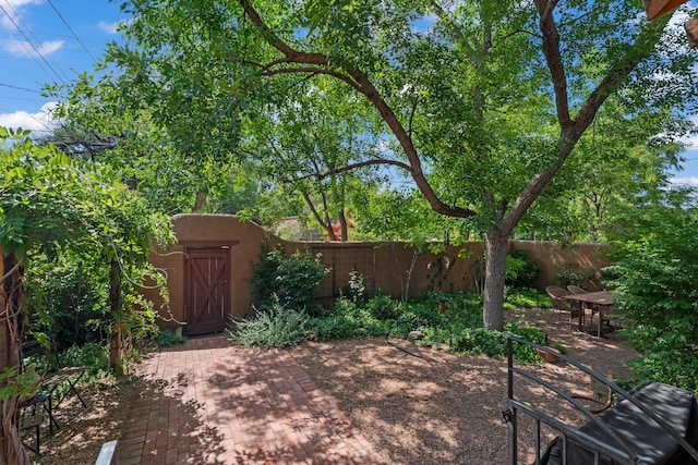 359 Garcia St, Santa Fe, NM 87501 - fenced backyard featuring a patio area