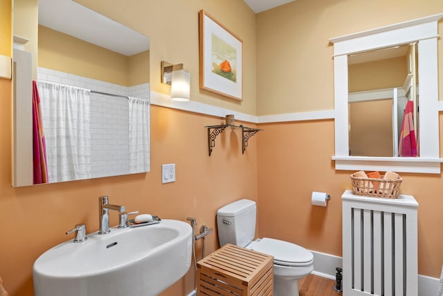 359 Garcia St, Santa Fe, NM 87501 - full bath with a shower with shower curtain and wood finished floors