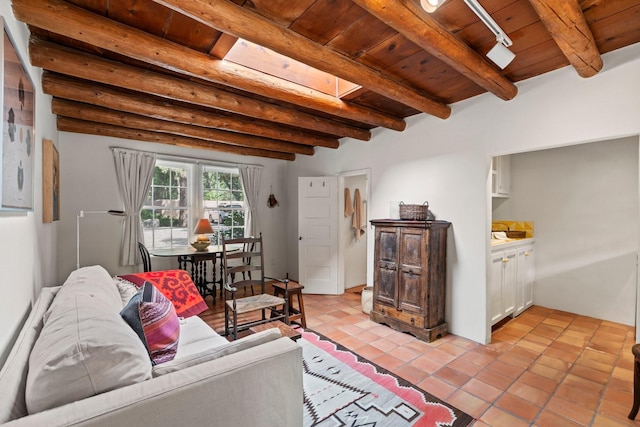 359 Garcia St, Santa Fe, NM 87501 - living area with a wood ceiling with exposed beams and light tile patterned flooring