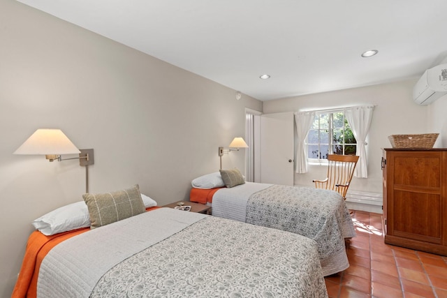 359 Garcia St, Santa Fe, NM 87501 - tiled bedroom featuring a wall mounted air conditioner and recessed lighting