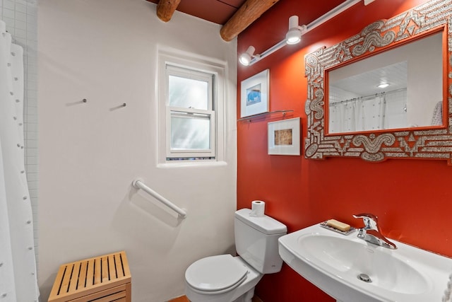 359 Garcia St, Santa Fe, NM 87501 - bathroom featuring beam ceiling and a shower with curtain