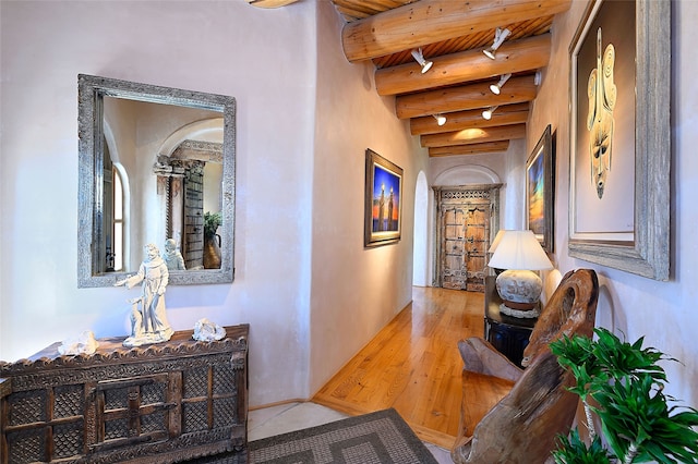 51 Coyote Mountain Rd, Santa Fe, NM 87505 - corridor with a wood ceiling with exposed beams and wood finished floors