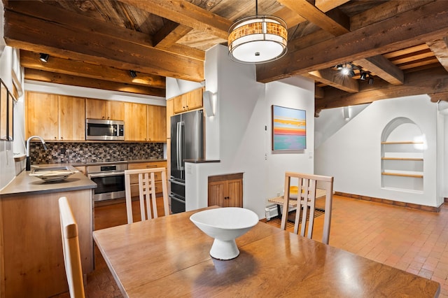 134 W Houghton St Unit D, Santa Fe, NM 87505 - dining space with a wood ceiling with exposed beams and brick patterned flooring