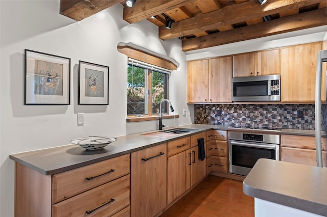 134 W Houghton St Unit D, Santa Fe, NM 87505 - kitchen with stainless steel appliances, decorative backsplash, a wooden ceiling with exposed beams, dark wood-style flooring, and dark countertops