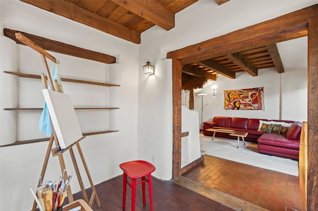 134 W Houghton St Unit D, Santa Fe, NM 87505 - interior space with brick flooring and a wood ceiling with exposed beams