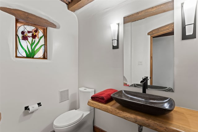 134 W Houghton St Unit D, Santa Fe, NM 87505 - bathroom with a sink and toilet