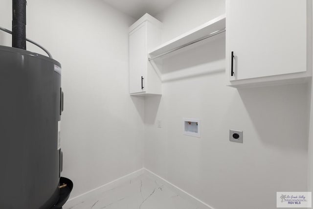 6245 Tiger Dr, Brownsville, TX 78521 - laundry room featuring electric dryer hookup, cabinet space, water heater, marble finish flooring, and washer hookup