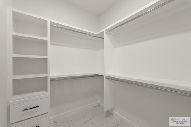6245 Tiger Dr, Brownsville, TX 78521 - spacious closet with light marble finish floors