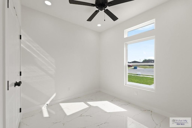 6245 Tiger Dr, Brownsville, TX 78521 - spare room with light marble finish flooring, recessed lighting, baseboards, and ceiling fan