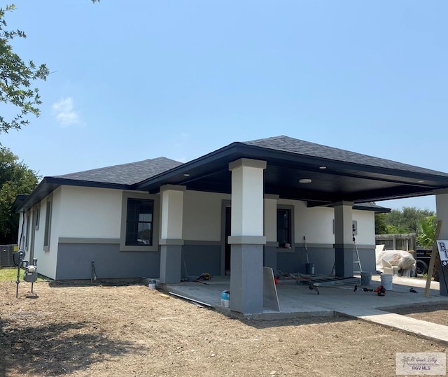 530 Star Ruby Ln, Brownsville, TX 78521 - rear view of property with a patio area, stucco siding, and a shingled roof