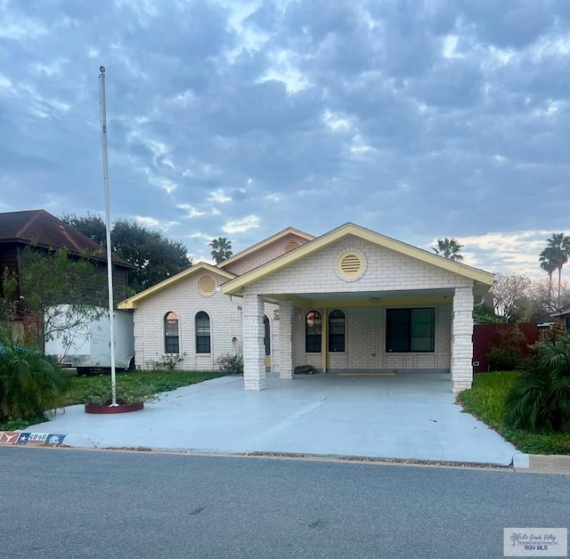 view of front of house with a carport