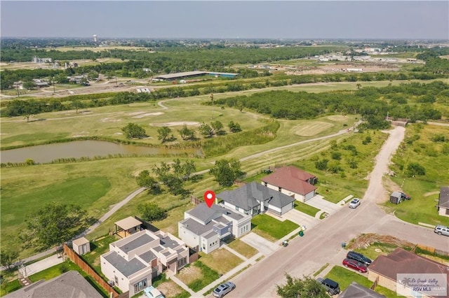 514 Hunt Ave, San Juan, TX 78589 - birds eye view of property featuring view of golf course and a water view
