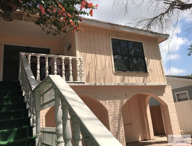 view of home's exterior featuring brick siding