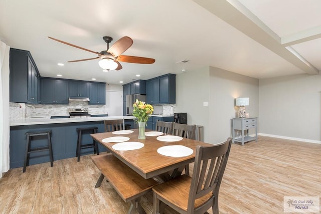 1409 Pine Ct, Harlingen, TX 78550 - dining space with light wood-style flooring, ceiling fan, baseboards, and recessed lighting