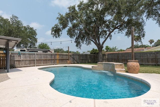 1409 Pine Ct, Harlingen, TX 78550 - view of pool with a fenced backyard and a patio