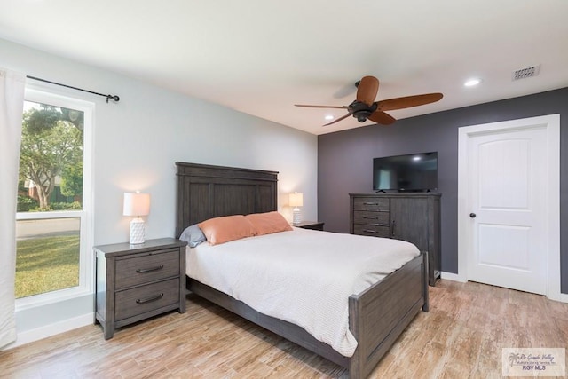 1409 Pine Ct, Harlingen, TX 78550 - bedroom with light wood-style floors, baseboards, recessed lighting, and a ceiling fan