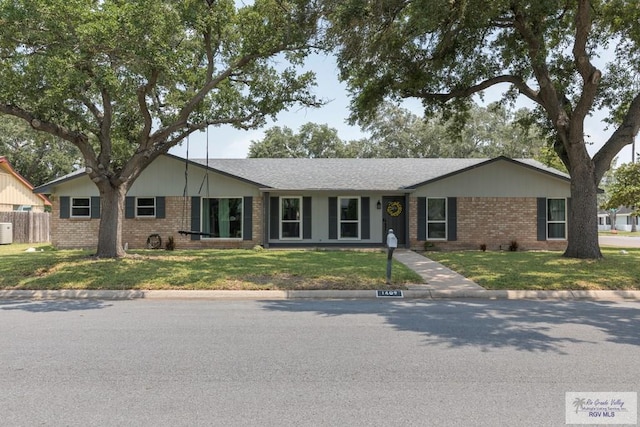1409 Pine Ct, Harlingen, TX 78550 - ranch-style house featuring brick siding