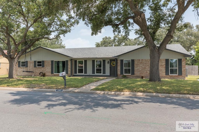 1409 Pine Ct, Harlingen, TX 78550 - ranch-style home with brick siding
