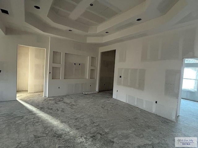 32711 Jorge St, Los Fresnos, TX 78566 - unfurnished living room featuring a tray ceiling