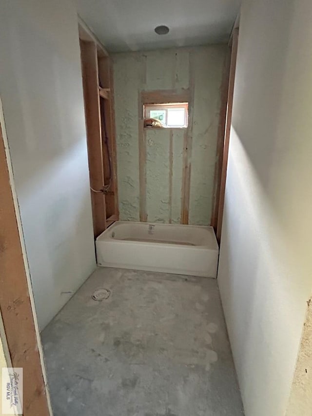 32711 Jorge St, Los Fresnos, TX 78566 - full bathroom featuring a bathtub and concrete floors