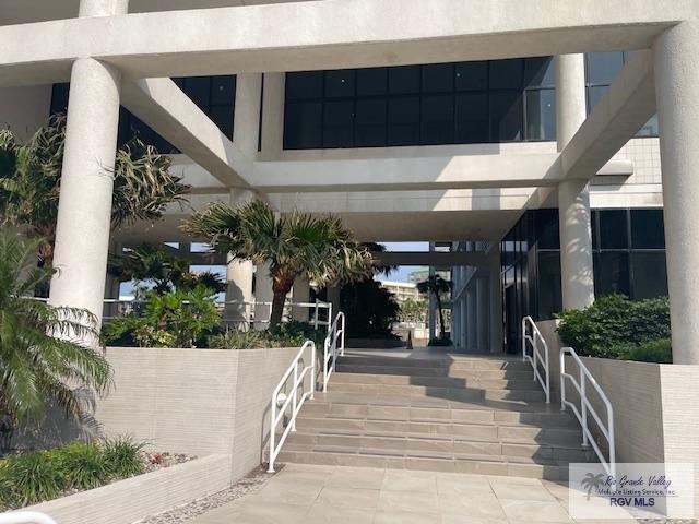 1000 Padre Blvd Unit 307, South Padre Island, TX 78597 - doorway to property featuring stucco siding