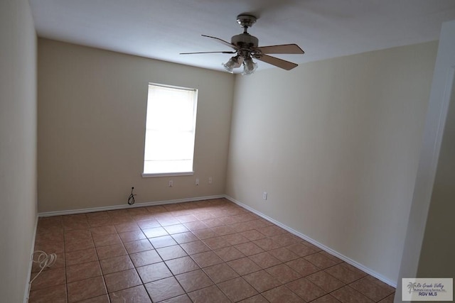 487 Agua Viva Ln, Brownsville, TX 78521 - tiled empty room with a ceiling fan and baseboards