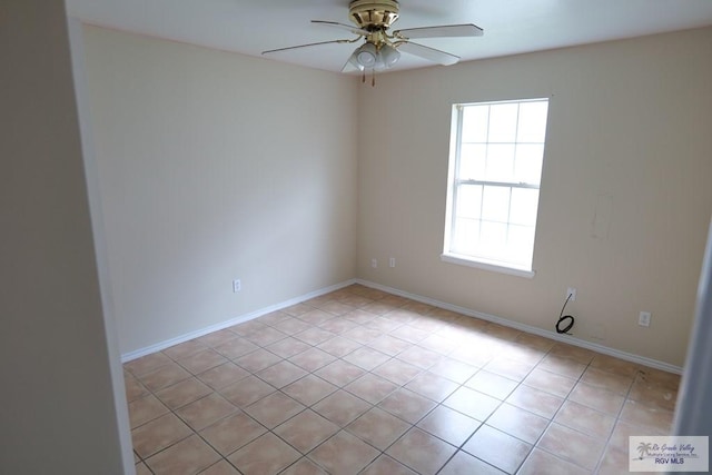 487 Agua Viva Ln, Brownsville, TX 78521 - unfurnished room featuring a ceiling fan, light tile patterned flooring, and baseboards