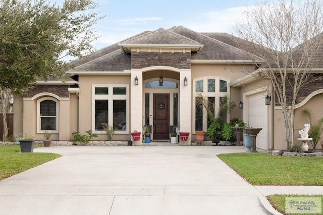 view of front of home with a garage