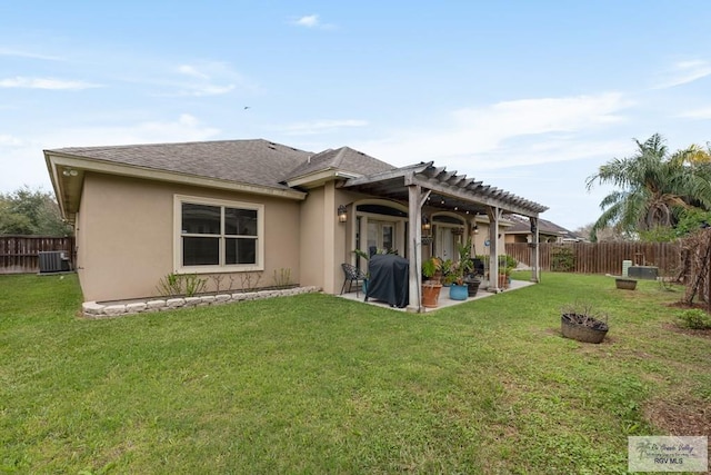 back of house featuring a yard, a pergola, central AC, and a patio area