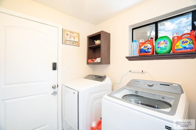 laundry room with separate washer and dryer